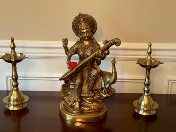 Maa Saraswathi with peacock