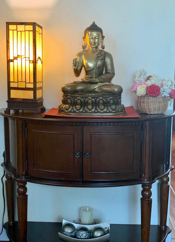 Buddha in Vitarka mudra seated on a double Lotus pedestal