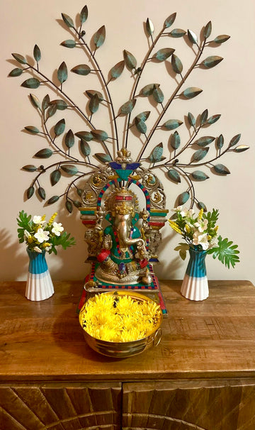 Lord Ganesh sitting on a Kirtimukha Throne