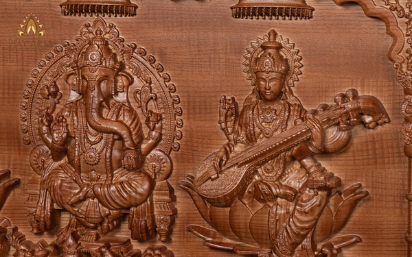 The Divine Trinities 14" x 28" Lord Ganesh, Goddess Lakshmi and Goddess Saraswathi Wood Carving