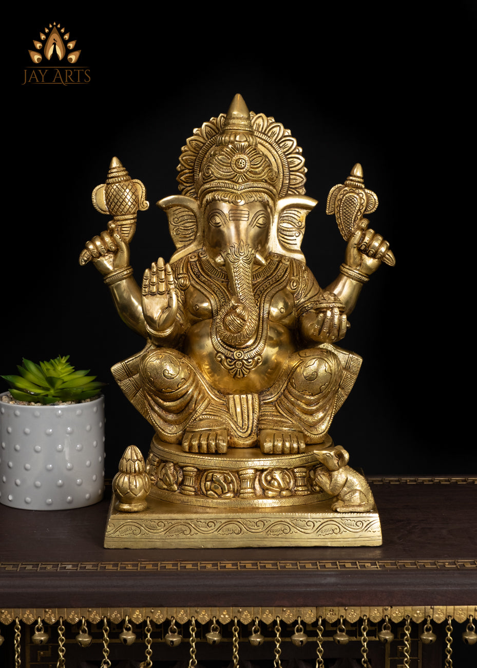 19" Brass Ganesha Seated On A Detailed Base With Sacred Symbols