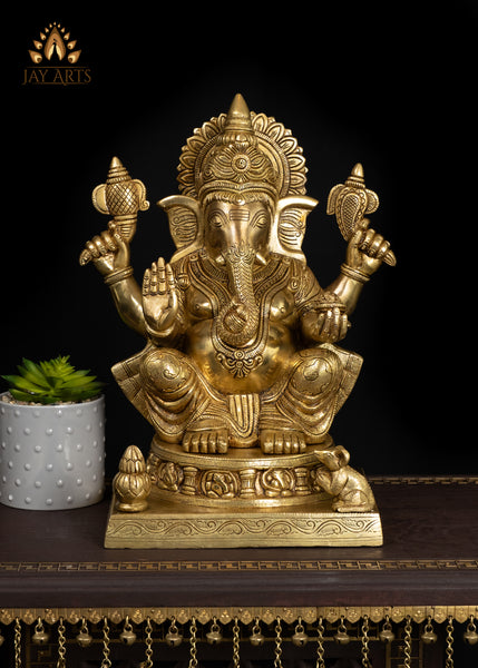 19" Brass Ganesha Seated On A Detailed Base With Sacred Symbols