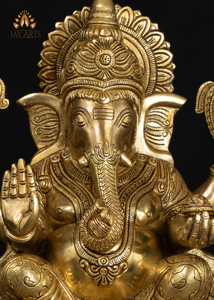 19" Brass Ganesha Seated On A Detailed Base With Sacred Symbols