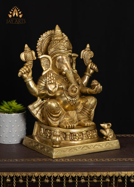 19" Brass Ganesha Seated On A Detailed Base With Sacred Symbols