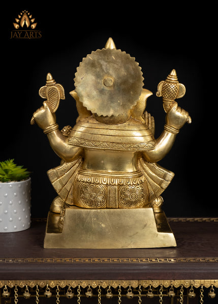 19" Brass Ganesha Seated On A Detailed Base With Sacred Symbols