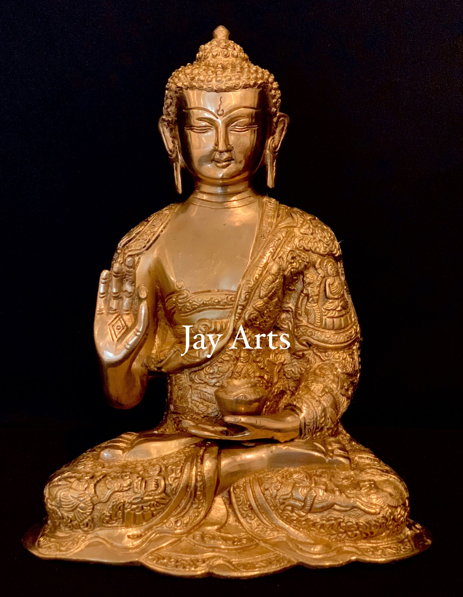 Buddha in Vitarka Mudra with a fine decorated robe