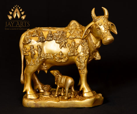 Cow and a Calf with Figurines of Gods and Goddesses