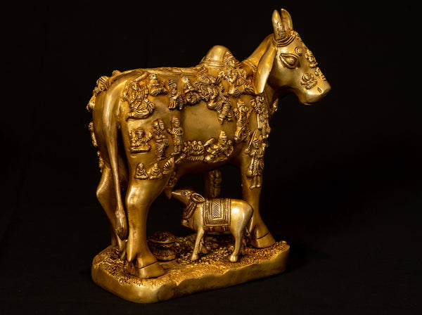 Cow and a Calf with Figurines of Gods and Goddesses