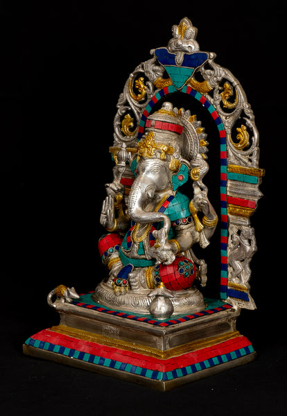 Lord Ganesh sitting on a Kirtimukha Throne