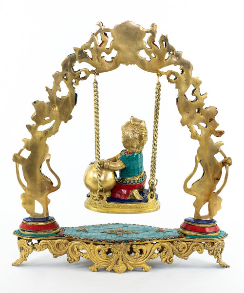 Baby Krishna on a Swing