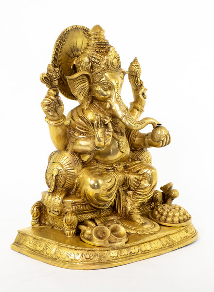Lord Ganapathi seated with Modak