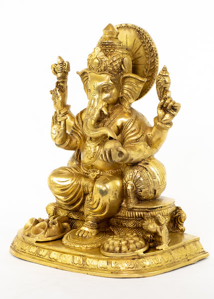 Lord Ganapathi seated with Modak