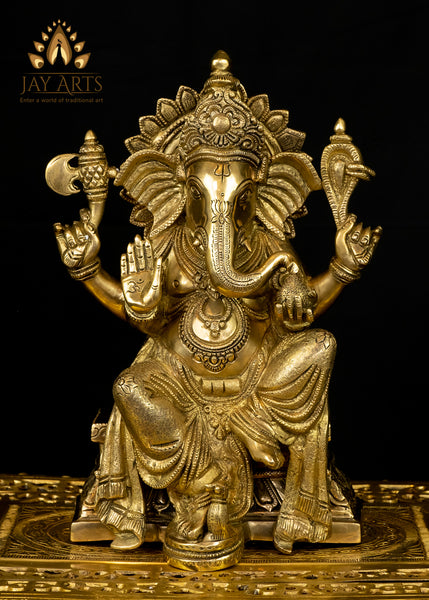 Abhaya Ganesh seated on a Decorated Pedestal