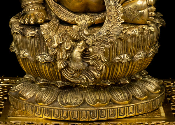 Raja Ganapathi seated on a raised Lotus Pedestal
