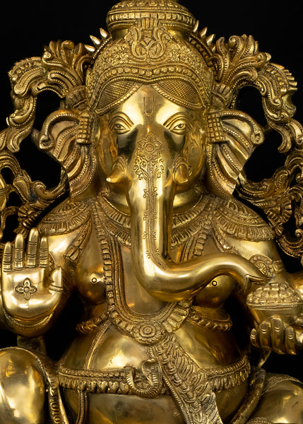 Raja Ganapathi seated on a raised Lotus Pedestal