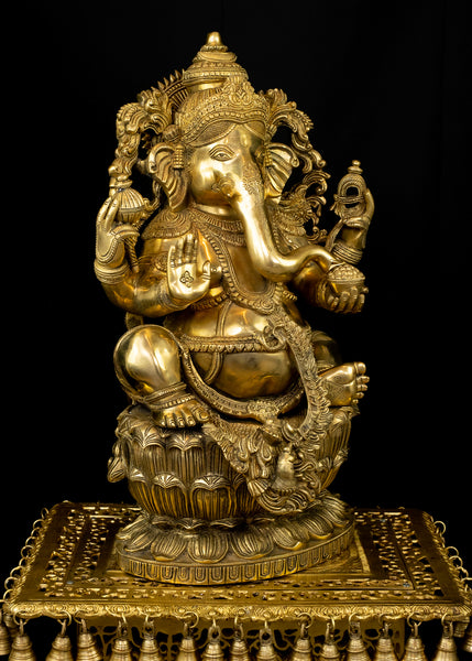 Raja Ganapathi seated on a raised Lotus Pedestal
