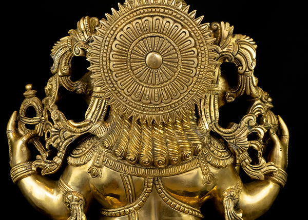 Raja Ganapathi seated on a raised Lotus Pedestal