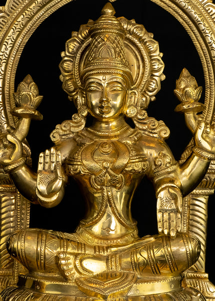 Goddess Mahalakshmi seated on a Kirtimukha Throne 17" Brass Statue