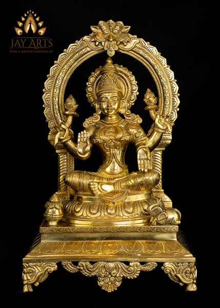 Goddess Mahalakshmi seated on a Kirtimukha Throne 17" Brass Statue