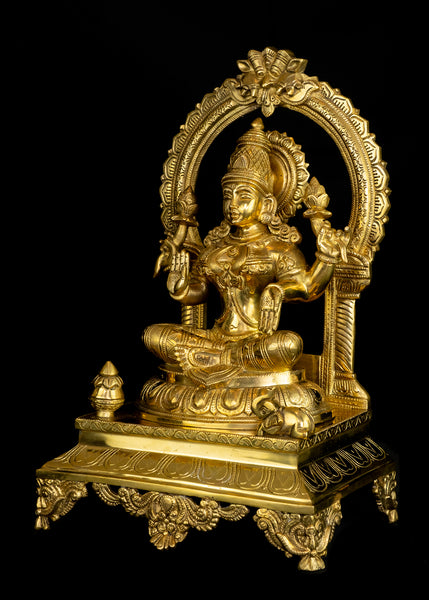 Goddess Mahalakshmi seated on a Kirtimukha Throne 17" Brass Statue