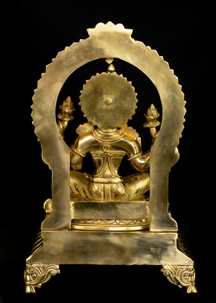 Goddess Mahalakshmi seated on a Kirtimukha Throne 17" Brass Statue