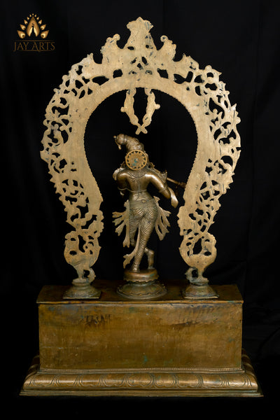 Bronze Sri Krishna Standing on a Cow Engraved Base with a Peacock Arch 44" - Lost-Wax Method Sculpture