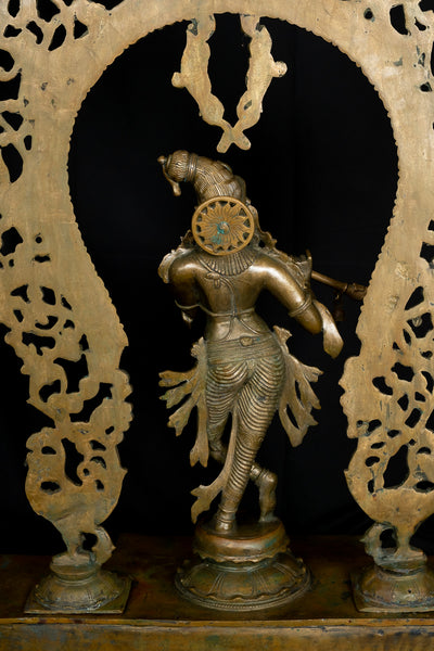 Bronze Sri Krishna Standing on a Cow Engraved Base with a Peacock Arch 44" - Lost-Wax Method Sculpture