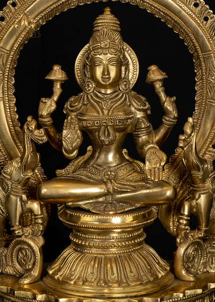 Goddess Lakshmi Seated on a Prabhavali Throne Flanked by Elephants 14" - Brass Statue