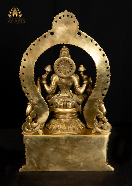 Goddess Lakshmi Seated on a Prabhavali Throne Flanked by Elephants 14" - Brass Statue
