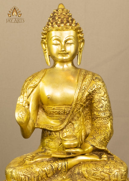 A glowing sculpture of Buddha 12.5" Brass Statue