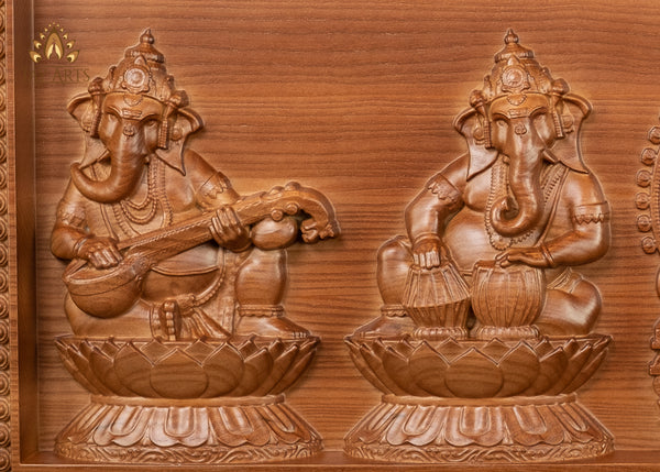 A Wood Carving of Lord Ganesh and The Musical Vignahartas 12" x 30"