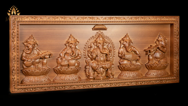 A Wood Carving of Lord Ganesh and The Musical Vignahartas 12" x 30"