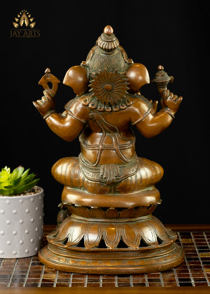Bhagwan Ganesh seated on a Lotus 14" Brass Statue (Antique Brown)