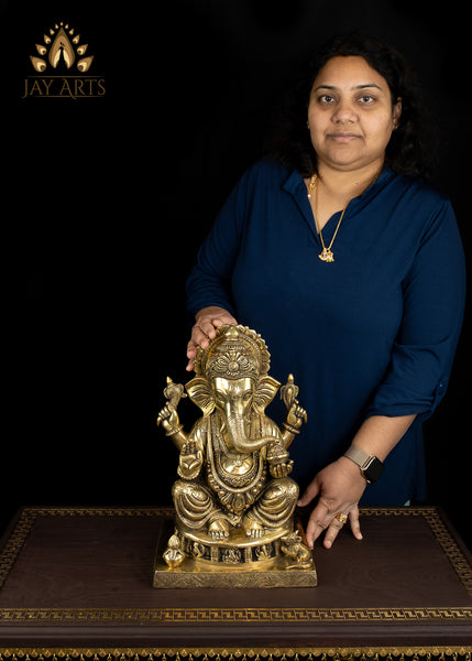 14" Bhagwan Ganesh seated on a pedestal with figurines of 8 Ganeshas