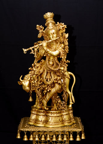 Lord Krishna - The Divine flutist with a cow