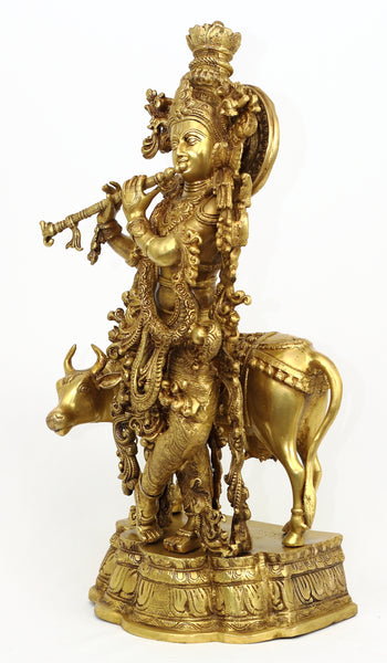 Lord Krishna - The Divine flutist with a cow