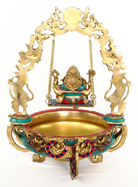 Jhoola Ganesh Urli - Lord Ganesha on a swing with a Urli
