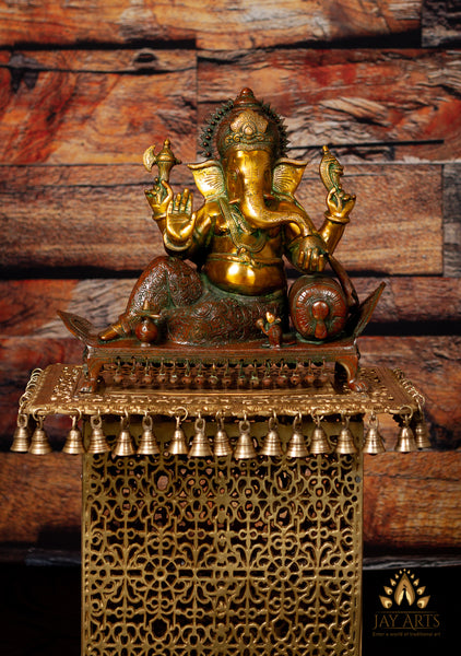 Bhagwan Ganesh seated on a chowki with ghungroos