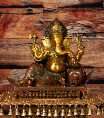 Bhagwan Ganesh seated on a chowki with ghungroos
