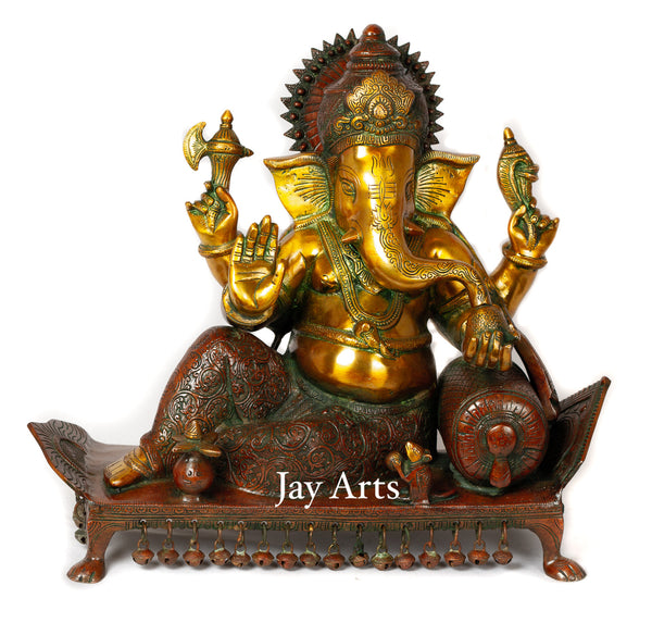 Bhagwan Ganesh seated on a chowki with ghungroos