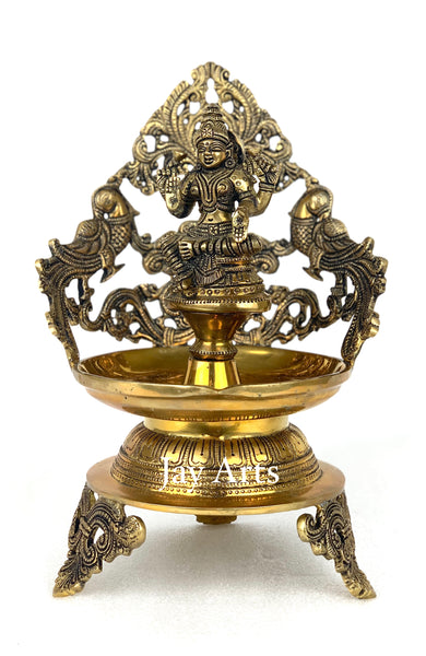 Goddess Lakshmi lamp with peacocks