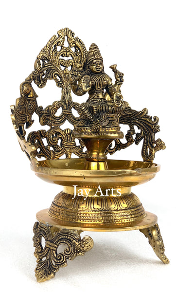 Goddess Lakshmi lamp with peacocks