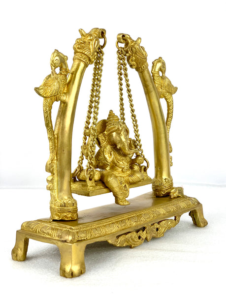 Lord Ganesh on peacock swing