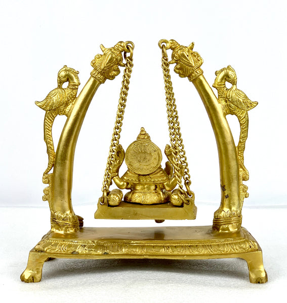 Lord Ganesh on peacock swing