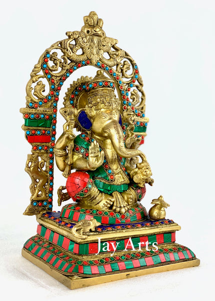 Lord Ganesh sitting on kirtimukha throne